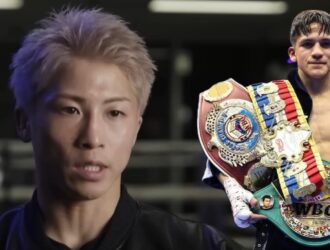 Naoya Inoue beside Jesse Rodriguez holding the WBC championship belts